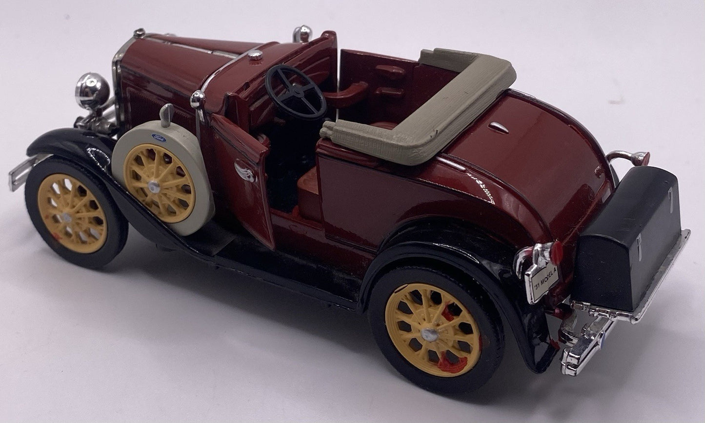 1931 Ford Model A 1:32 scale die cast collectible. Pre-owned. Missing Windshield